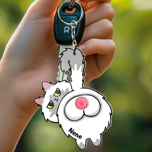 Custom acrylic cat keychain featuring a cute cat design with a personalized name