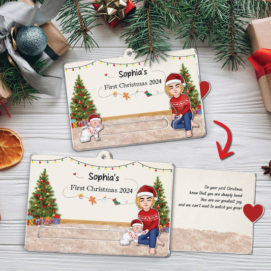 Personalized custom acrylic Christmas slider card featuring holiday trees and family characters for first Christmas 2024