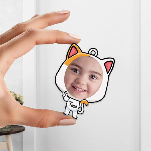 Custom acrylic photo keychain shaped like a cat with a child's photo inside