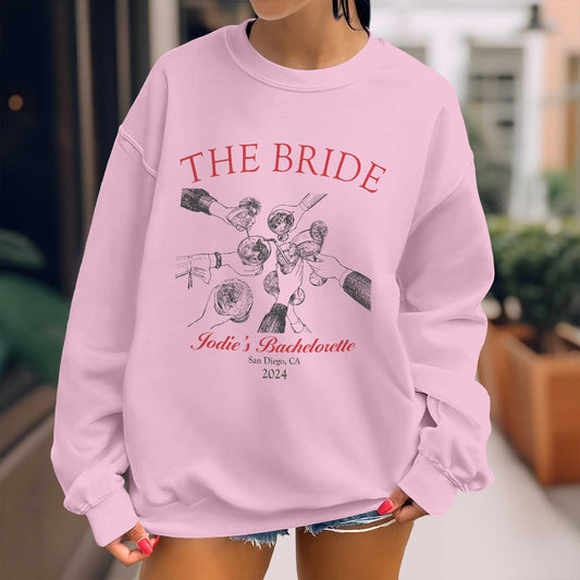 Pink custom besties bach club shirt with The Bride and bachelorette toast graphic