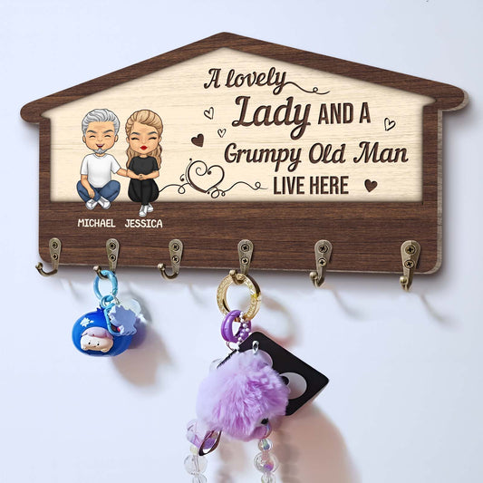 Custom couple key holder featuring cartoon couple design with hooks for keys and personalized names