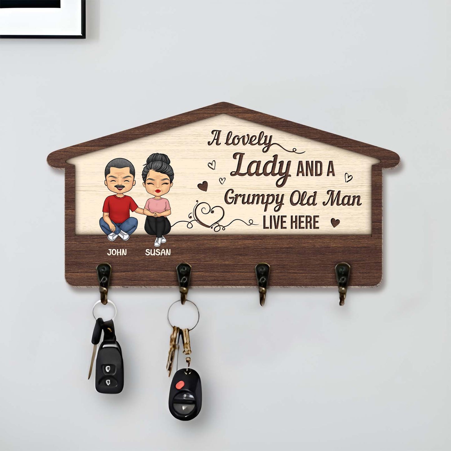 Custom couple key holder with personalized names John and Susan, featuring a cozy home design