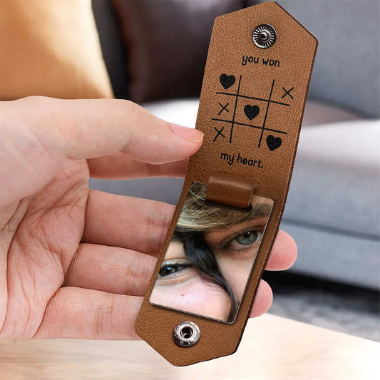 Custom couple keychain gift with engraved tic-tac-toe design and mirror for a romantic touch