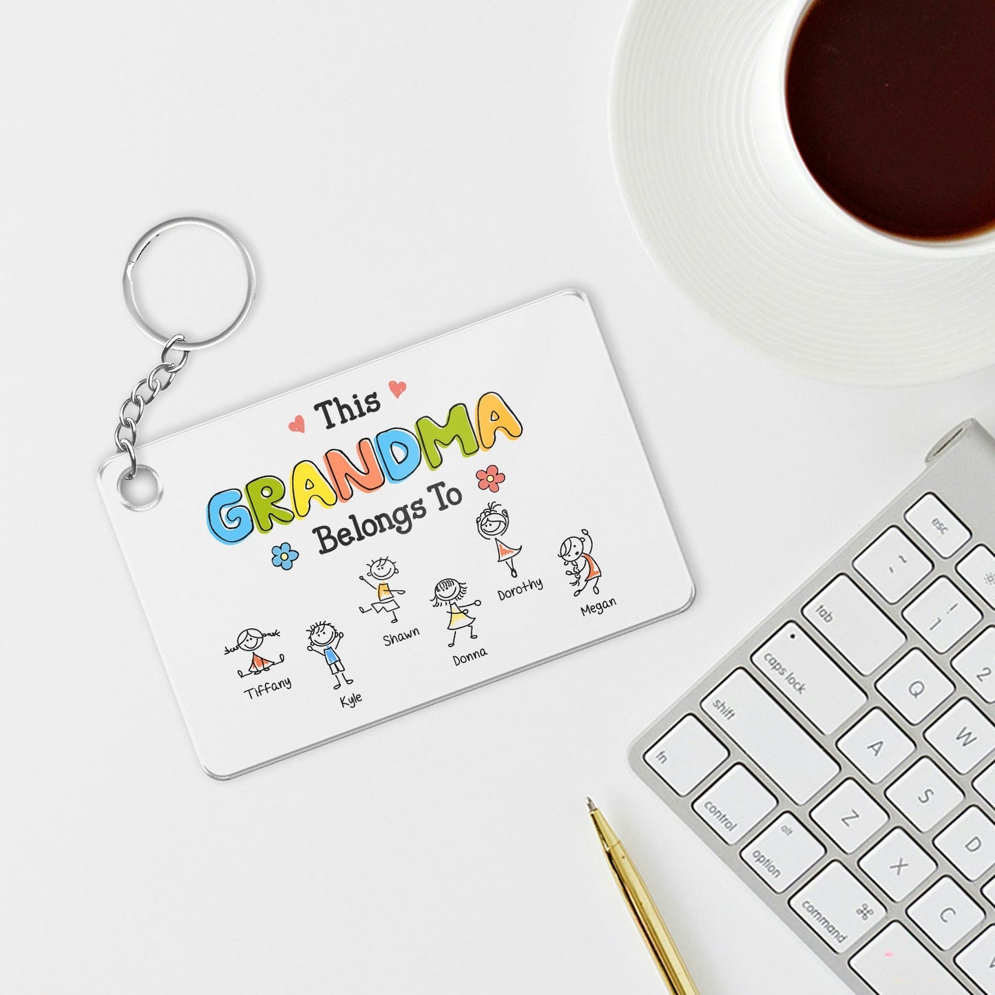 Custom family acrylic keychain with a heartfelt message and colorful illustrations for Grandma