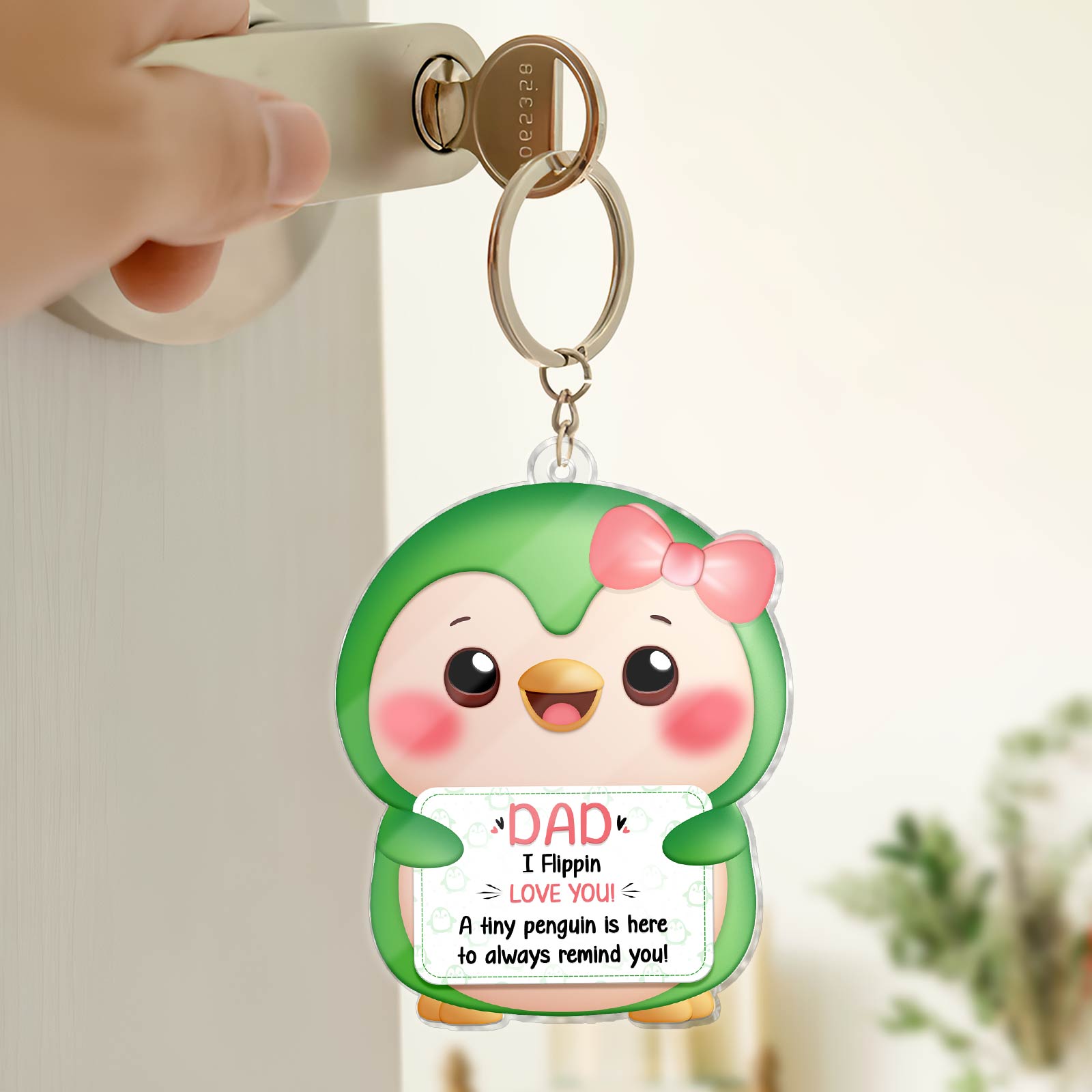 Custom family keychain gift featuring a cute penguin holding a heartfelt message for Dad