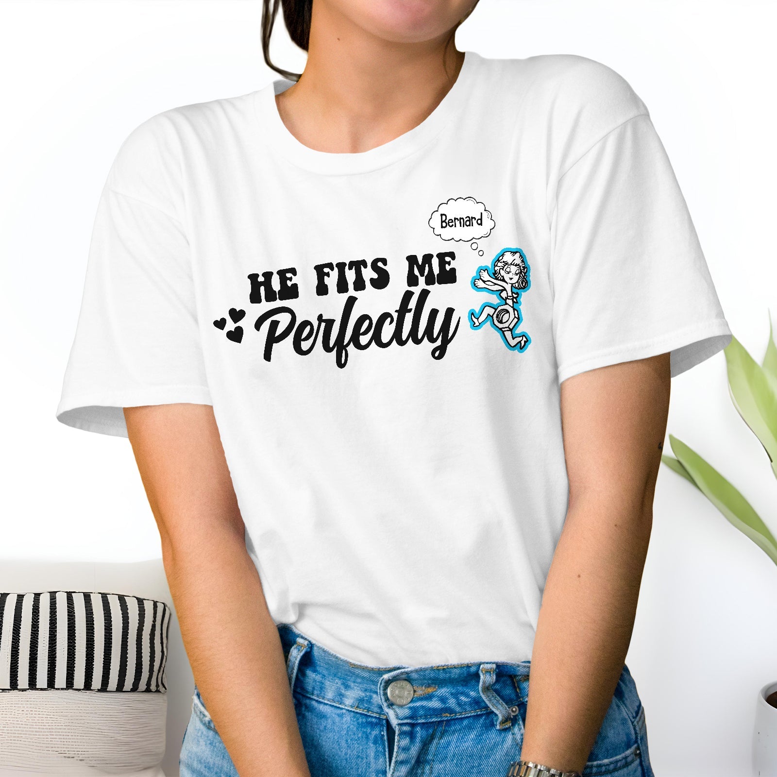 White custom fits me perfectly shirt with black text and cartoon design worn by woman