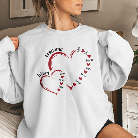 Custom light of my life shirt with personalized names inside red heart designs on white sweatshirt