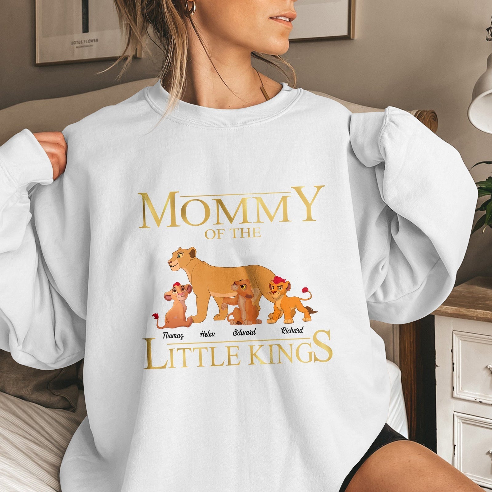Woman wearing a custom mother of little kings shirt with lion family design and names printed