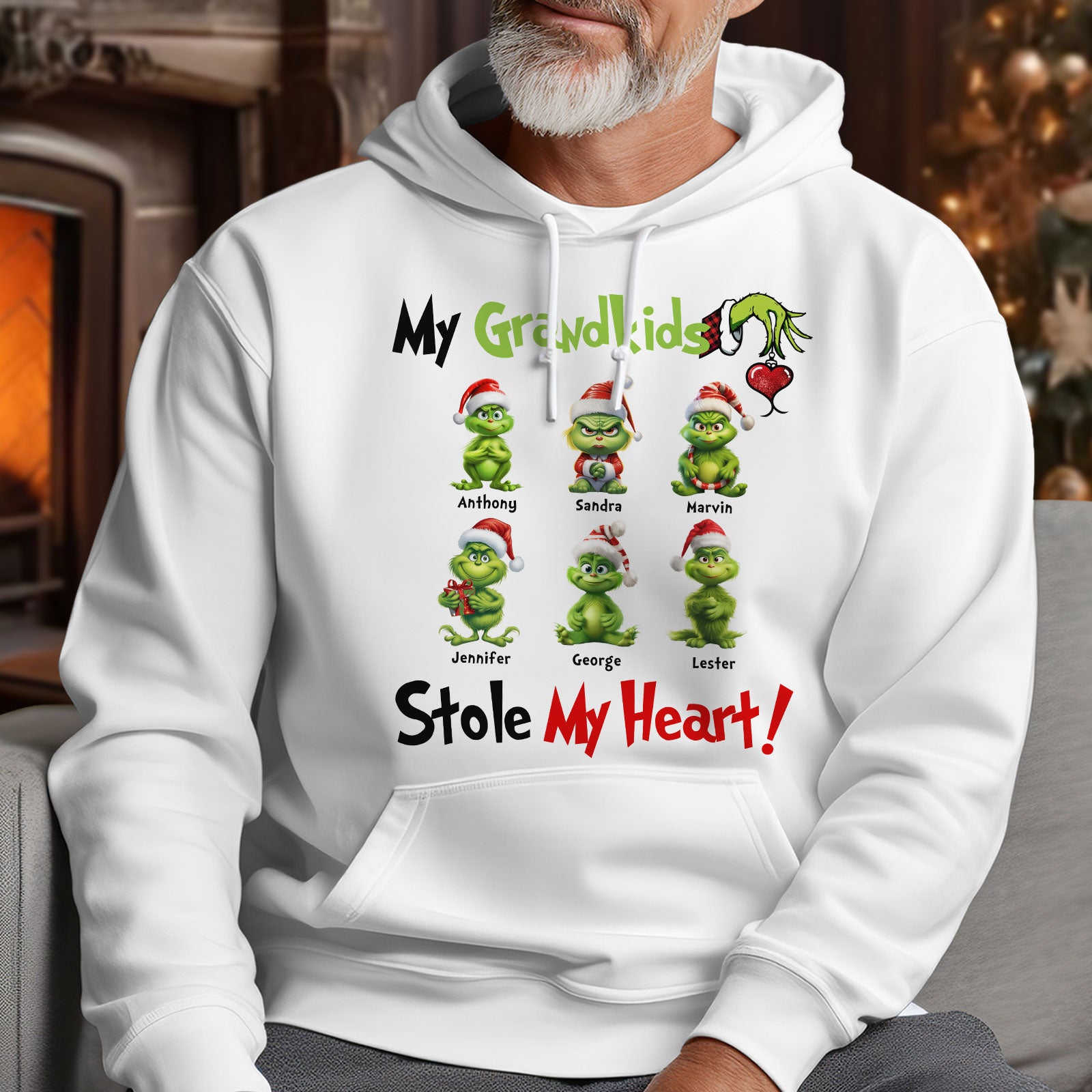 White custom my grandkids stole my heart t-shirt hoodie with cartoon Grinch characters and grandkids names