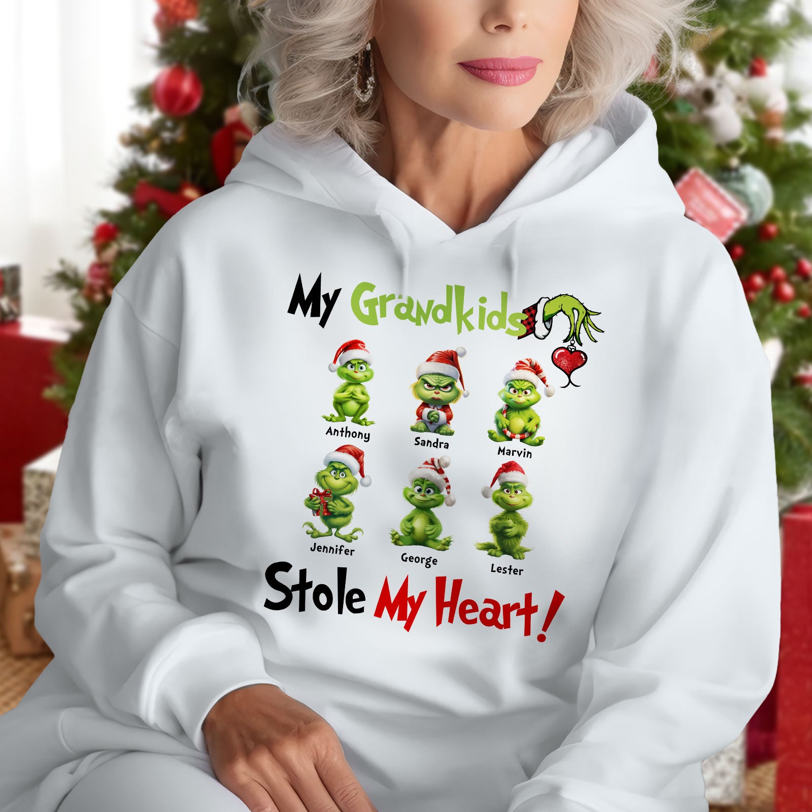 Custom my grandkids stole my heart t-shirt with Grinch characters and grandkids names in holiday design