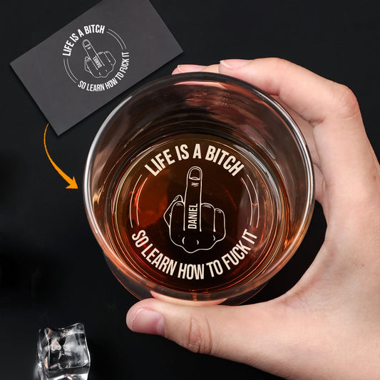 Personalized Whiskey Glass with engraved bottom showing middle finger and phrase Life Is a Bitch so learn how to fuck it