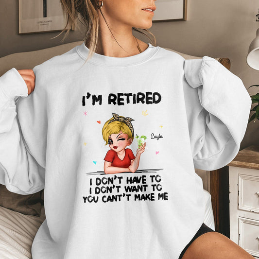 Woman wearing white sweatshirt with custom retired gift for women design featuring a playful retired quote