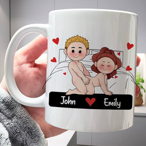 Custom romantic mug for couples featuring cartoon couple in bed with personalized names John and Emily