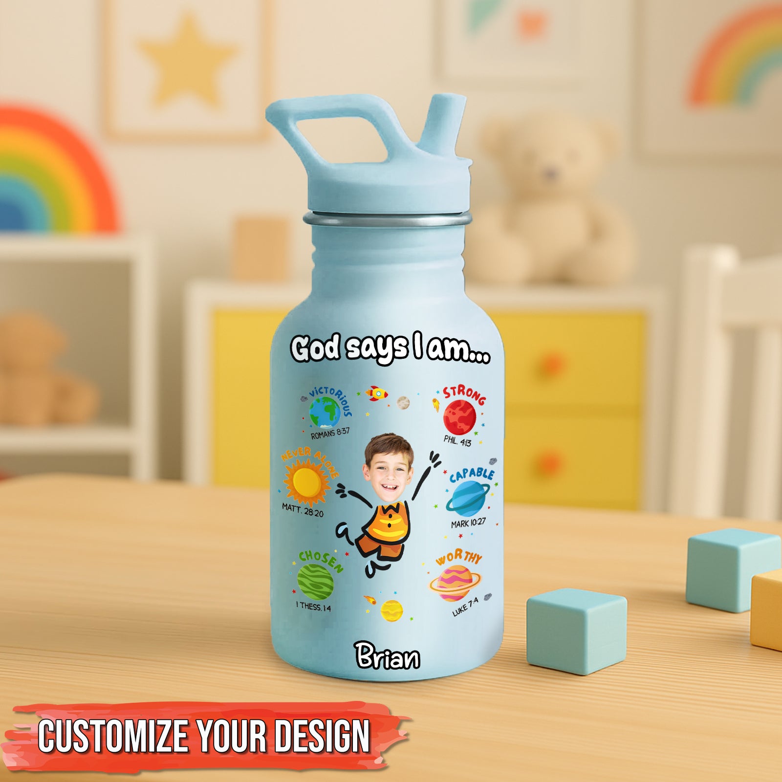 Personalized blue water bottle for kids with inspirational quotes and a photo on a wooden table