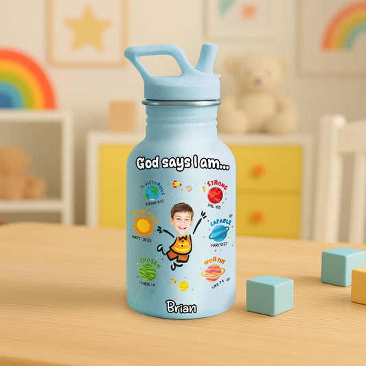 Light blue Water Bottle For Kids with inspirational design and personalized name on a wooden table
