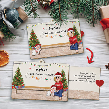 Personalized custom wooden Christmas slider card with festive trees and family illustration for first Christmas 2024