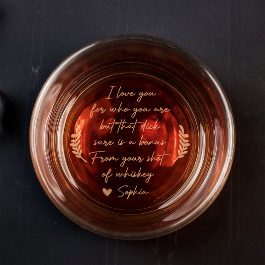 Top view of 365Gifty Personalized Whiskey Glass with amber whiskey and engraved romantic message at base