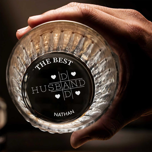 Crystal cut Personalized Whiskey Glass held in hand showing engraved The Best Husband monogram and custom name