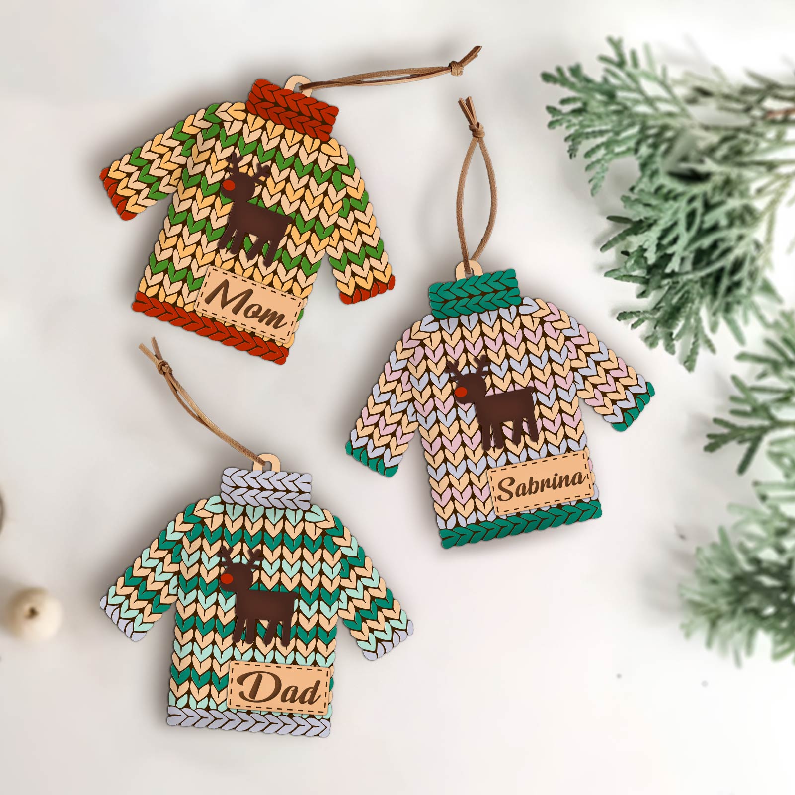 365Gifty customizable holiday stocking tag set with three colorful sweater shapes personalized for Mom Dad and Sabrina