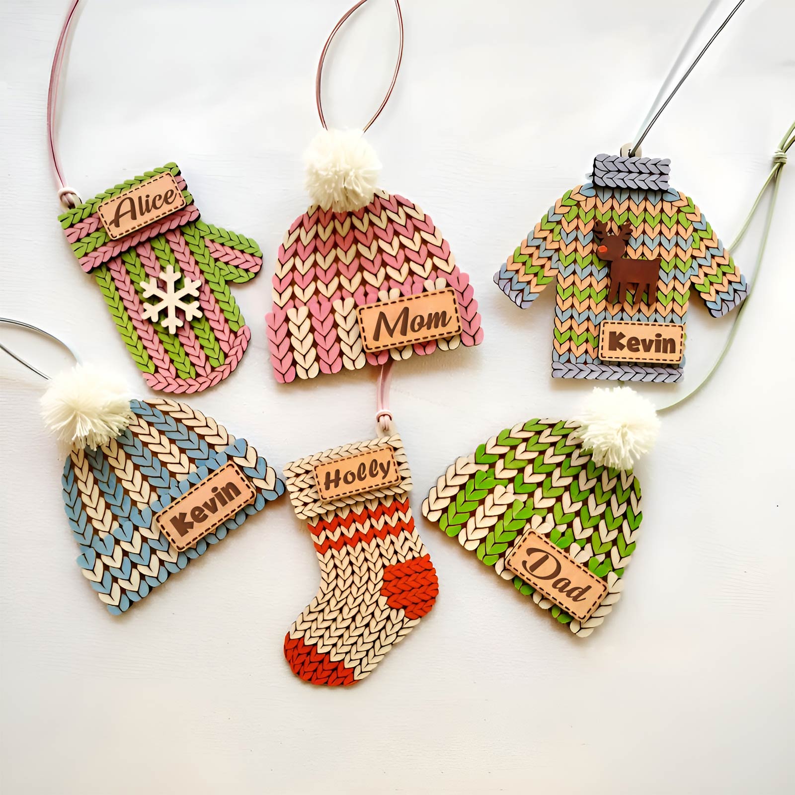Colorful customizable holiday stocking tag set with knit design shapes and personalized name labels