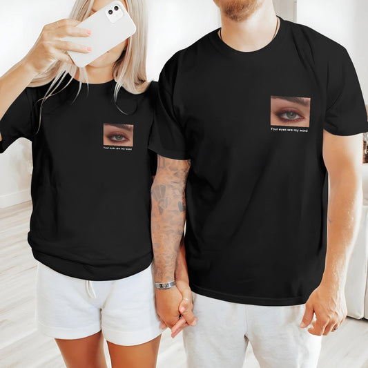 Couple wearing matching black t-shirts with eye image and text, a perfect choice for customized gifts for loved ones