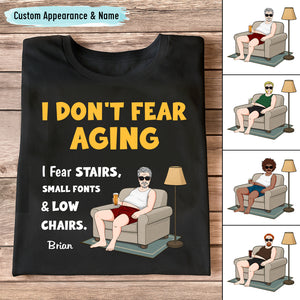 Black personalized retirement shirt with humorous I DONT FEAR AGING design showing man in chair and custom name