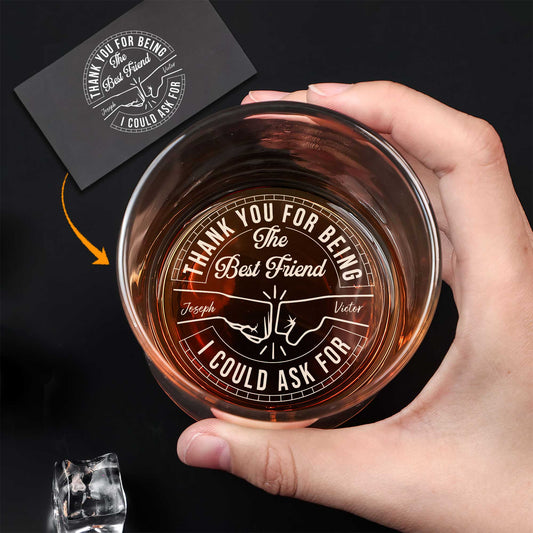 Personalized Whiskey Glass held from above showing engraved thank you for being the best friend message