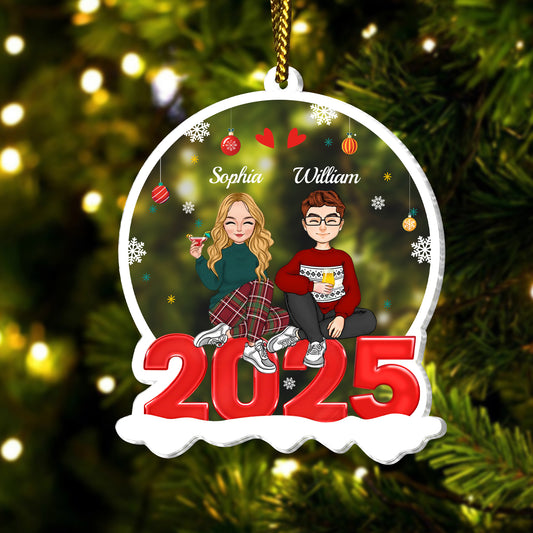 Personalized family Christmas tree decoration featuring names and a 2025 design with festive elements