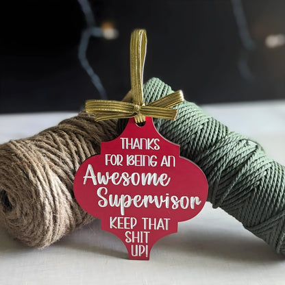 Funny Christmas wooden ornament in red with gold ribbon saying thanks for being an awesome supervisor