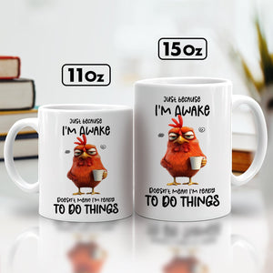 Funny personalized mug featuring a cartoon chicken with the phrase I'm awake but not ready to do things
