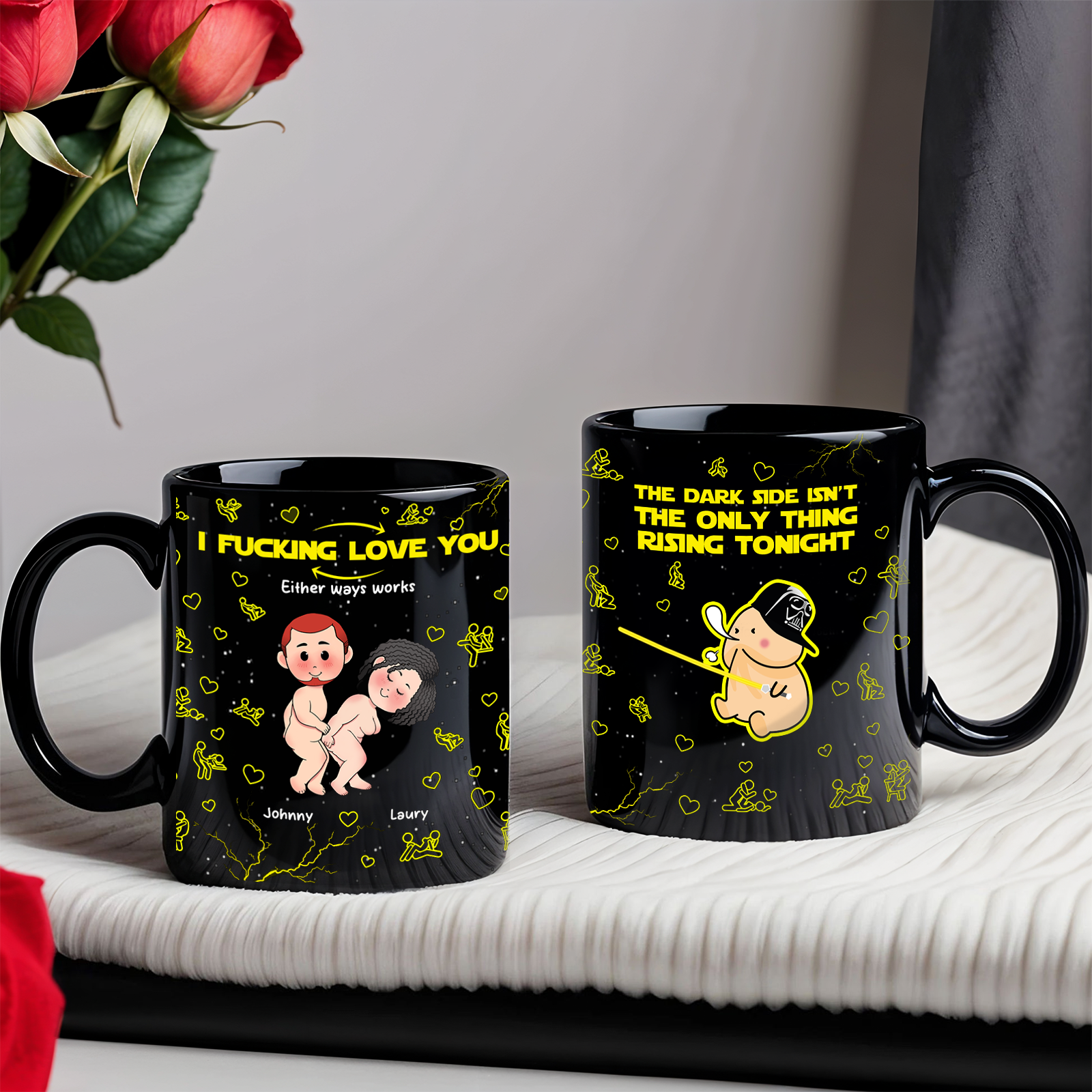Two black ceramic mugs with cheeky cartoon lovers and yellow text the dark side mug for anniversary