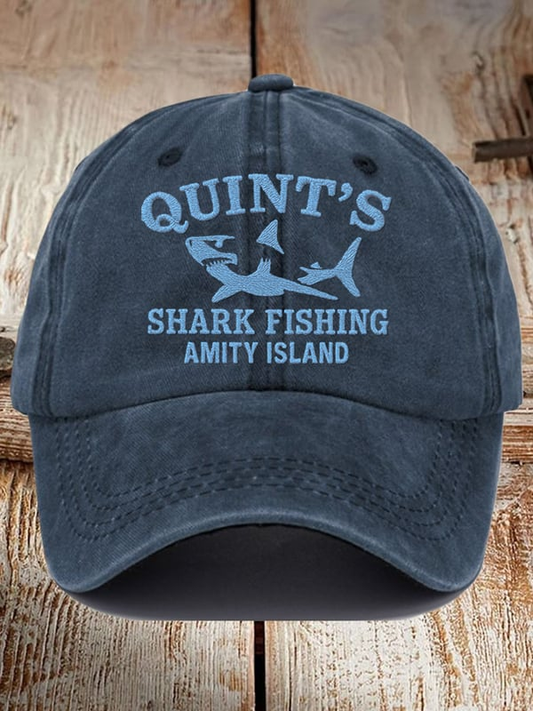 Great white shark baseball cap in navy blue with Quint's Shark Fishing Amity Island logo