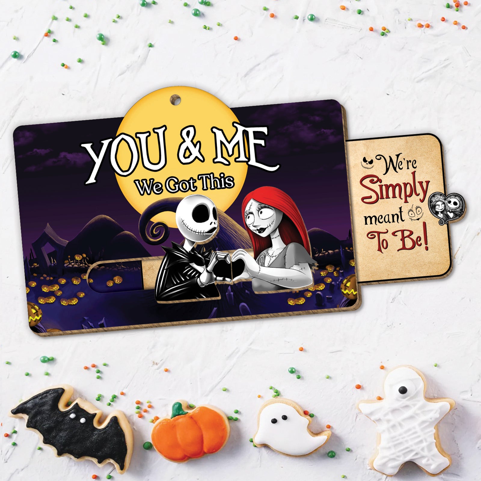 Jack and Sally wooden slider card with You and Me message and Halloween-themed cookies around