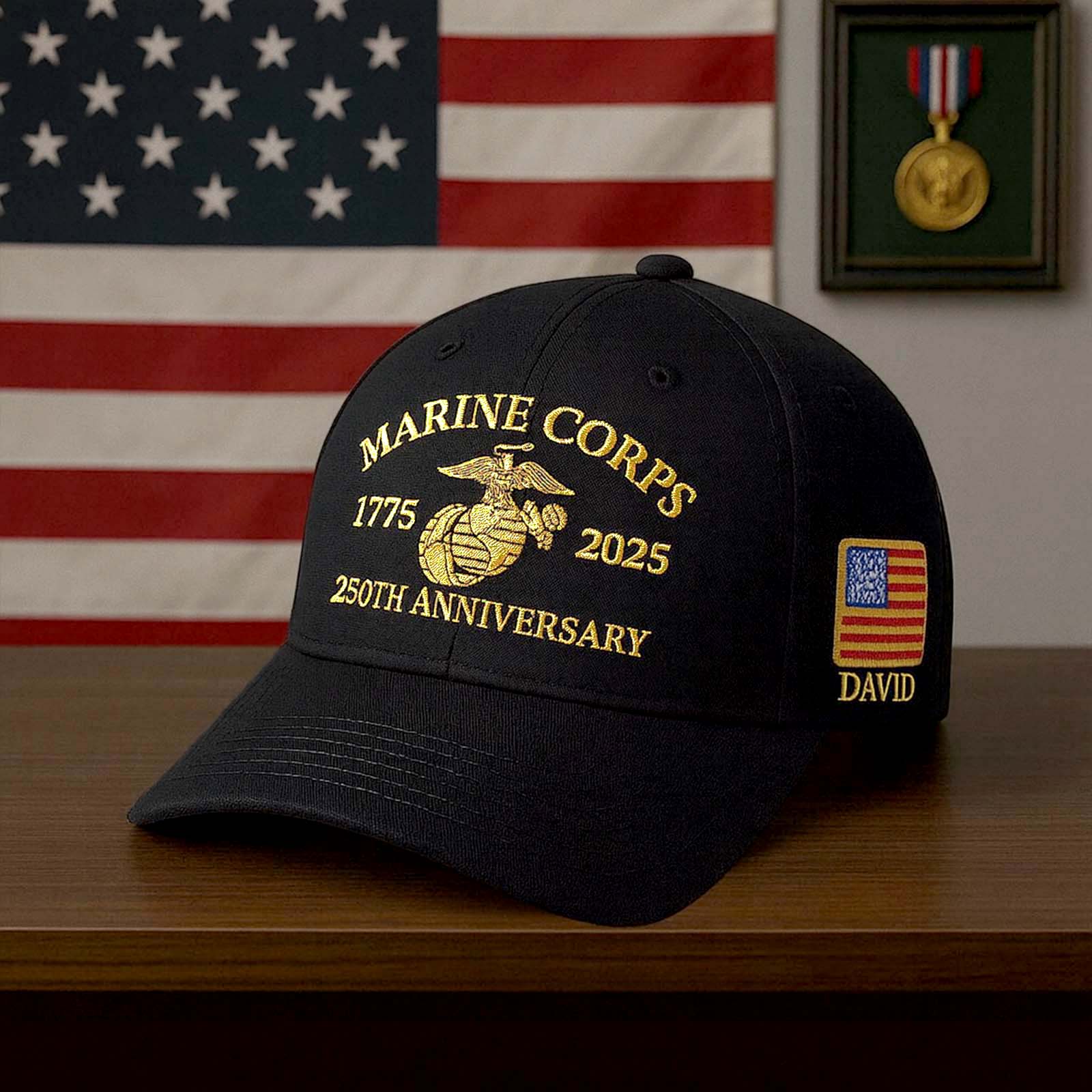 Marine Corps 250th anniversary hat featuring gold embroidery and American flag patch on the side