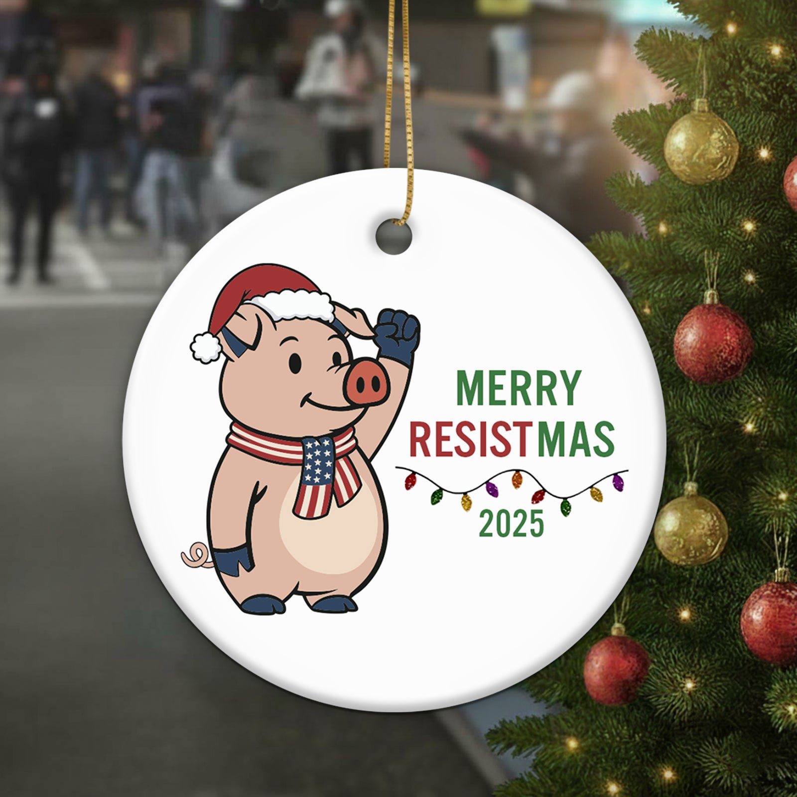 Merry Resistmas 2025 ceramic ornament featuring a festive pig design with a Santa hat