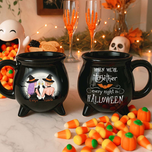 Personalized Witches Ceramic Cauldron Mug two black cauldron mugs with names Evelyn and Isabella by candy corn and Halloween decor