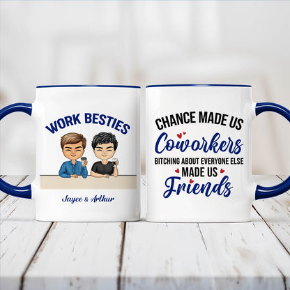 Two white ceramic mugs with blue handles featuring Work Besties cartoon and friend quote ideal unique gifts for coworkers