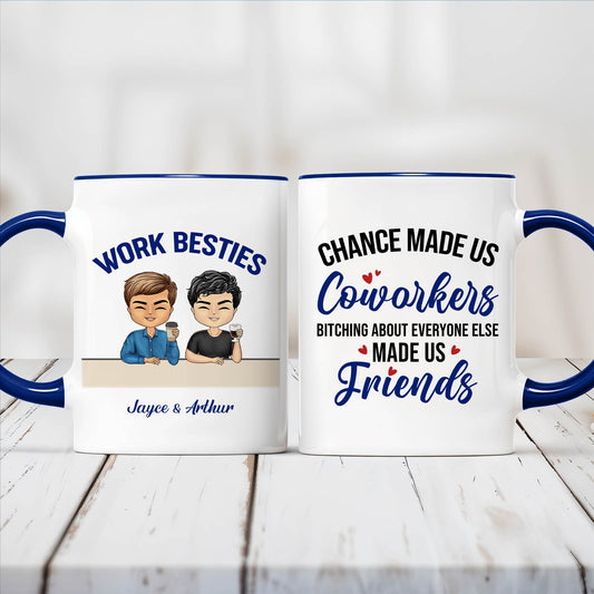 Two white ceramic mugs with blue handles featuring Work Besties cartoon and friend quote ideal unique gifts for coworkers