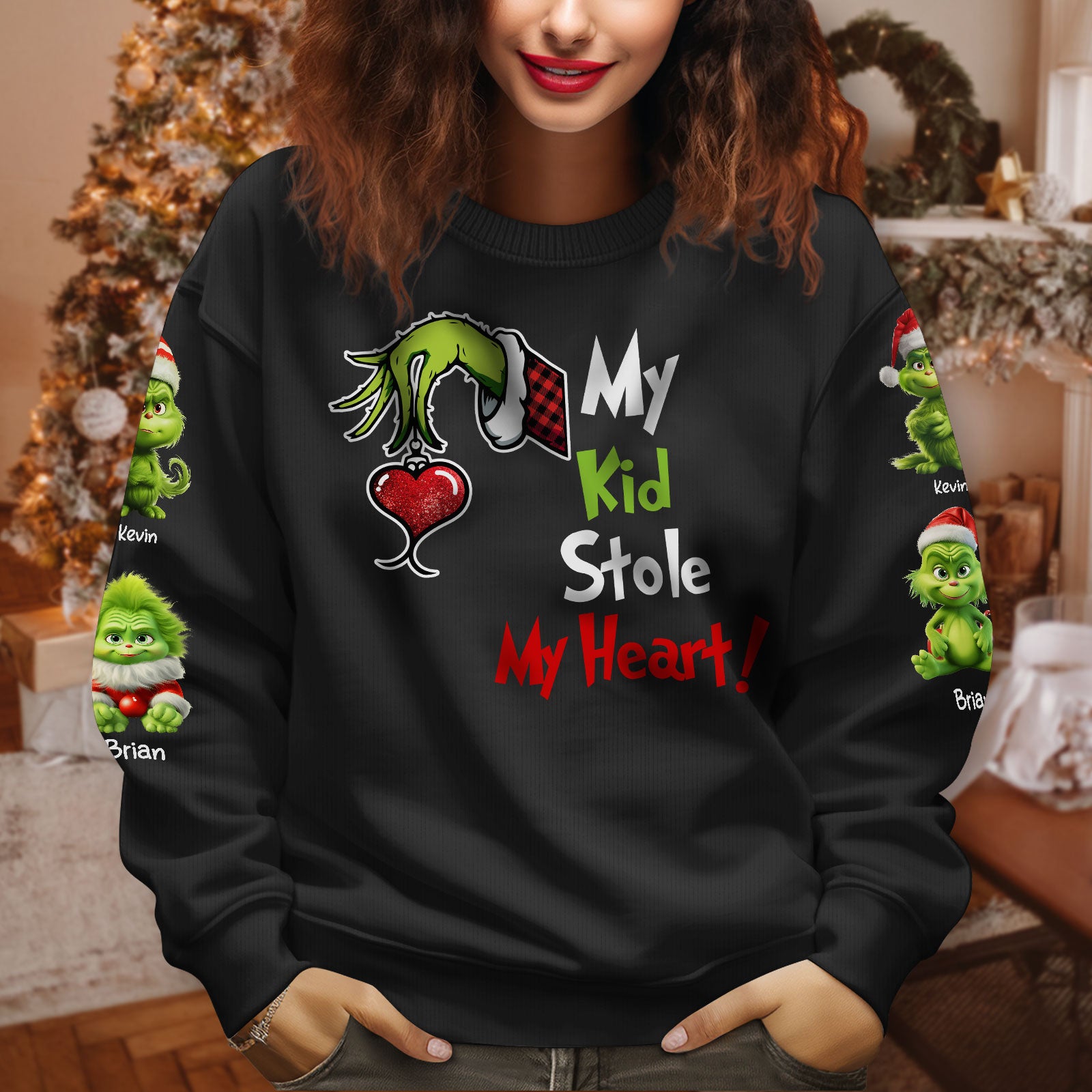 Black sweatshirt with Christmas Grinch design and my kid stole my heart shirt text in red green and white