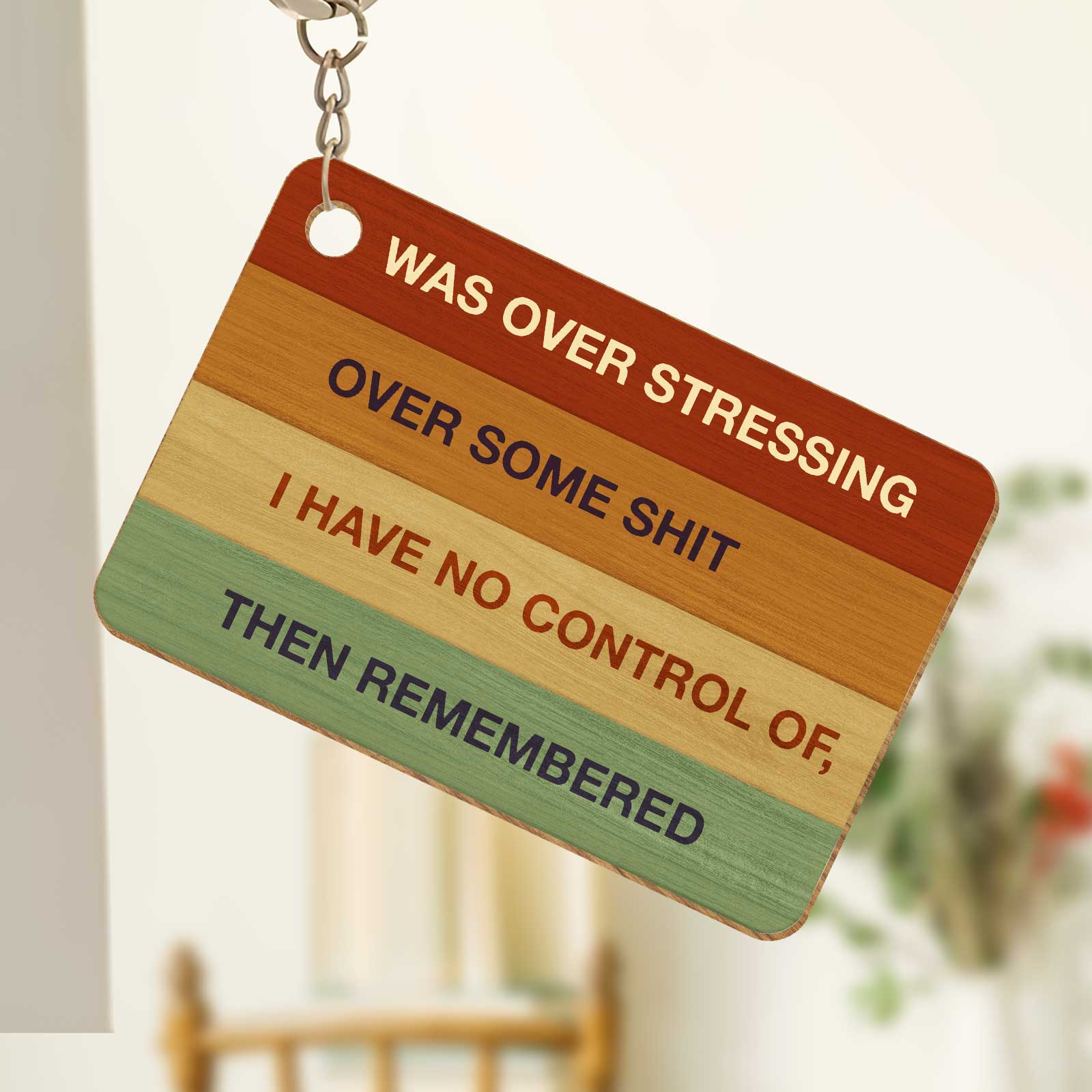 Personalized acrylic keychain featuring stress relief message in colorful design