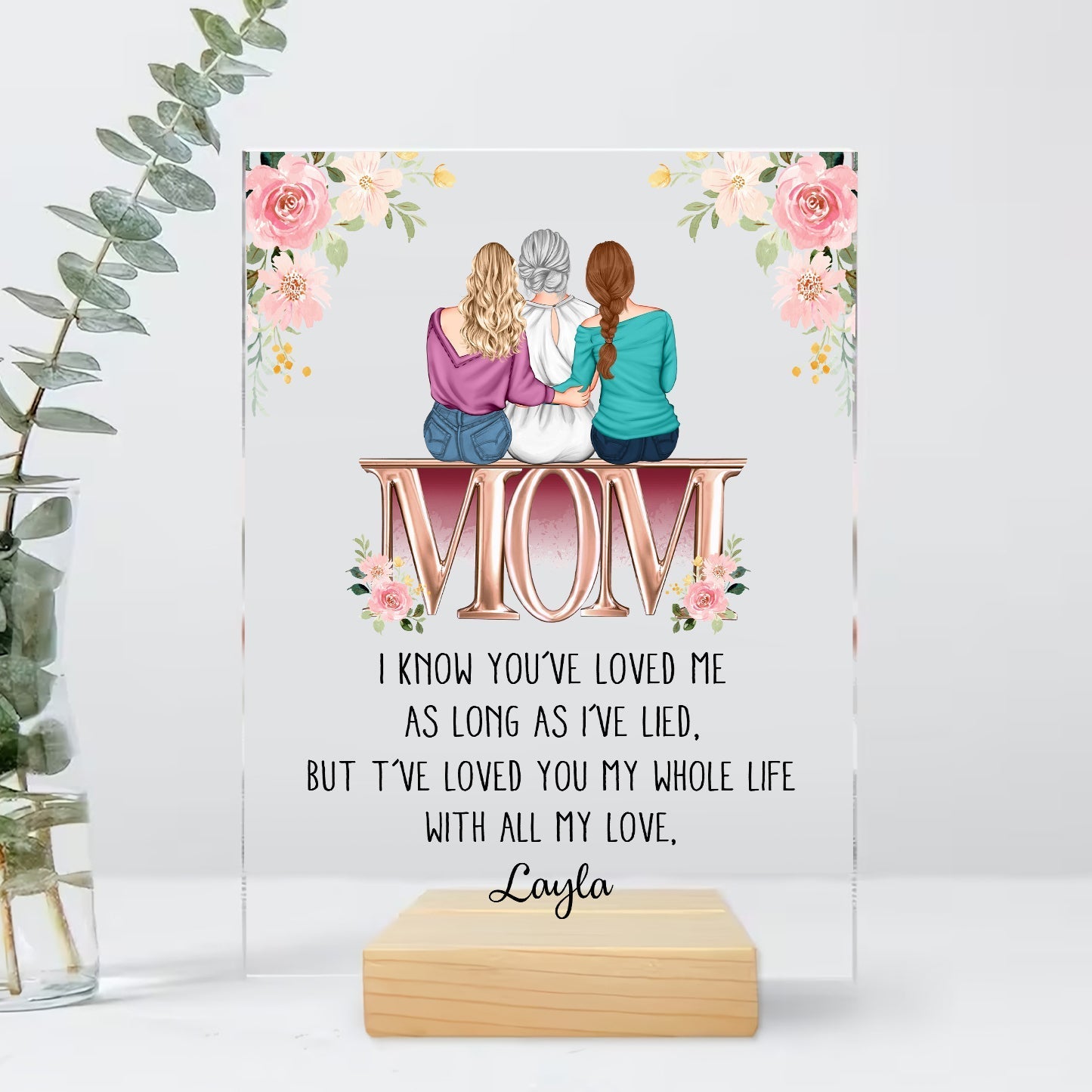 Personalized acrylic mom plaque featuring three women with floral accents and heartfelt message