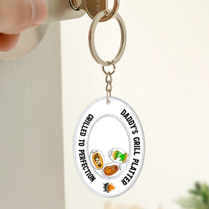 Personalized acrylic shaking keychain featuring 'Daddy's Grill Platter' design with colorful food icons