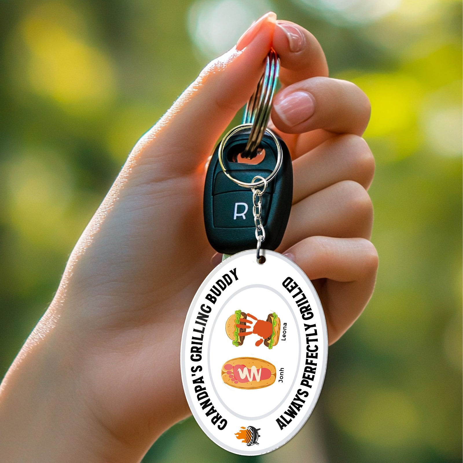 Personalized acrylic shaking keychain featuring a grilling theme with custom text design