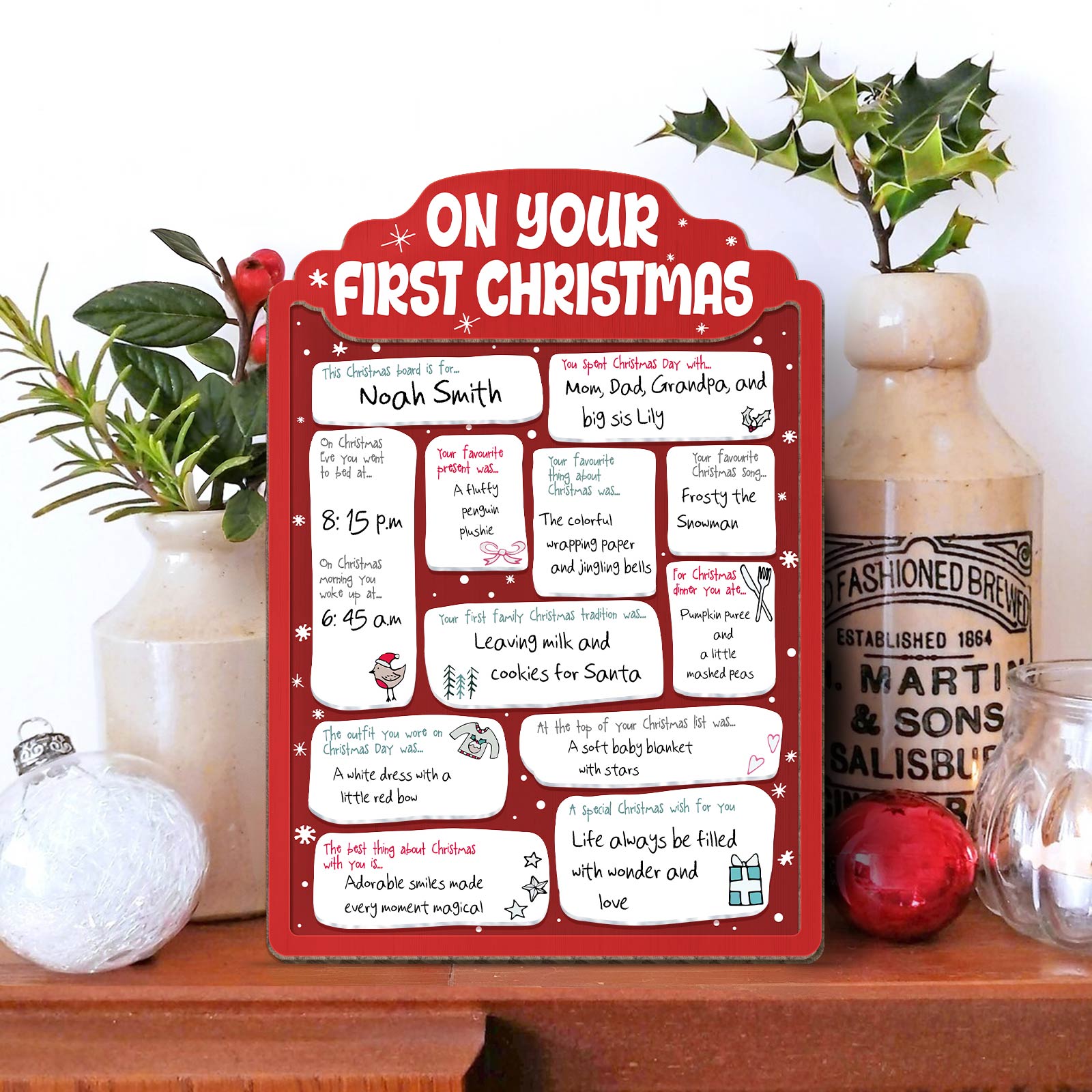 Personalized baby's first Christmas sign in red with custom name and holiday memories details