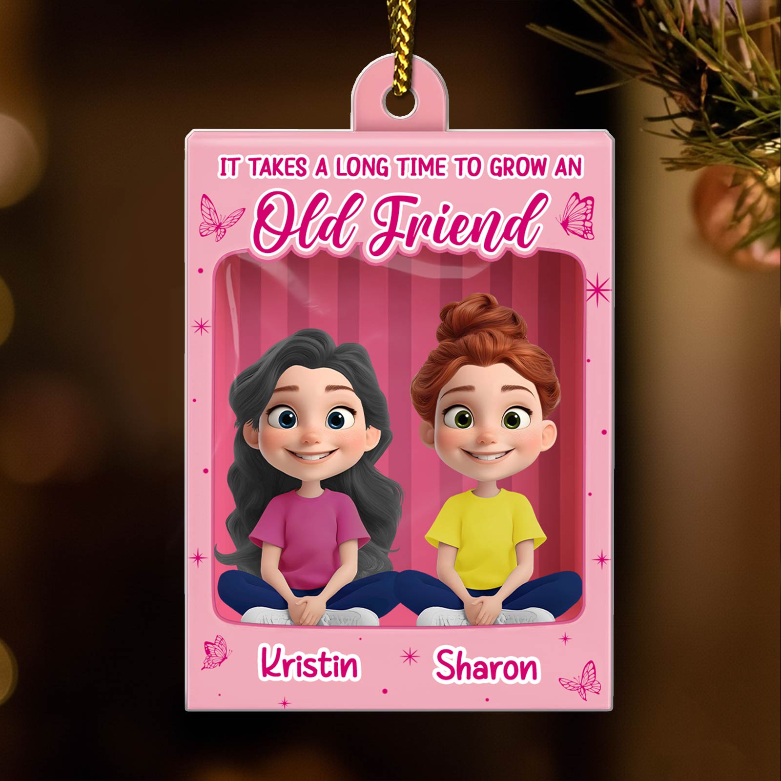 Personalized best friend Christmas ornament featuring cartoon characters Kristin and Sharon with a pink background