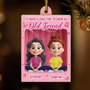 Personalized best friend Christmas ornament featuring cartoon characters Kristin and Sharon with a pink background