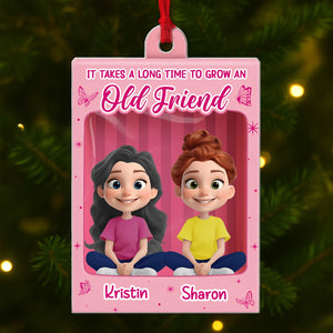 Personalized best friend Christmas ornament featuring two cartoon girls and the text It Takes a Long Time to Grow an Old Friend