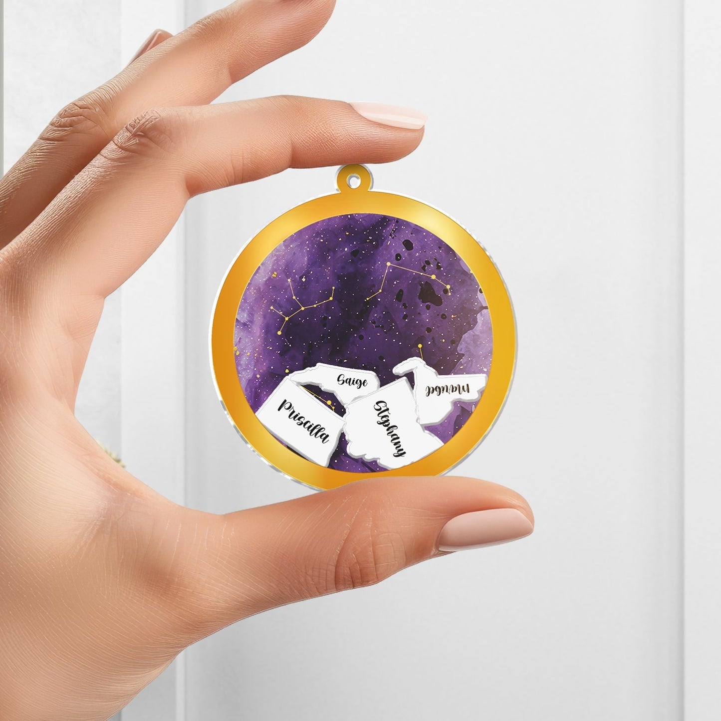 Personalized best friend keychain with a cosmic design and names inscribed for a unique gift