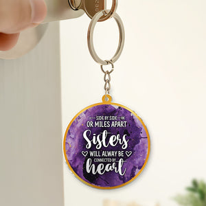 Personalized best friend keychain with purple design and heartfelt message about sisters and connection