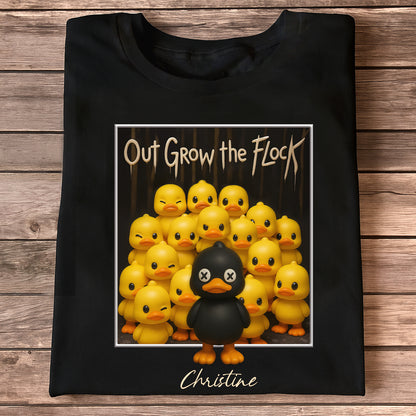 Personalized black duck shirt with cartoon yellow and black ducks and the text Out Grow the Flock
